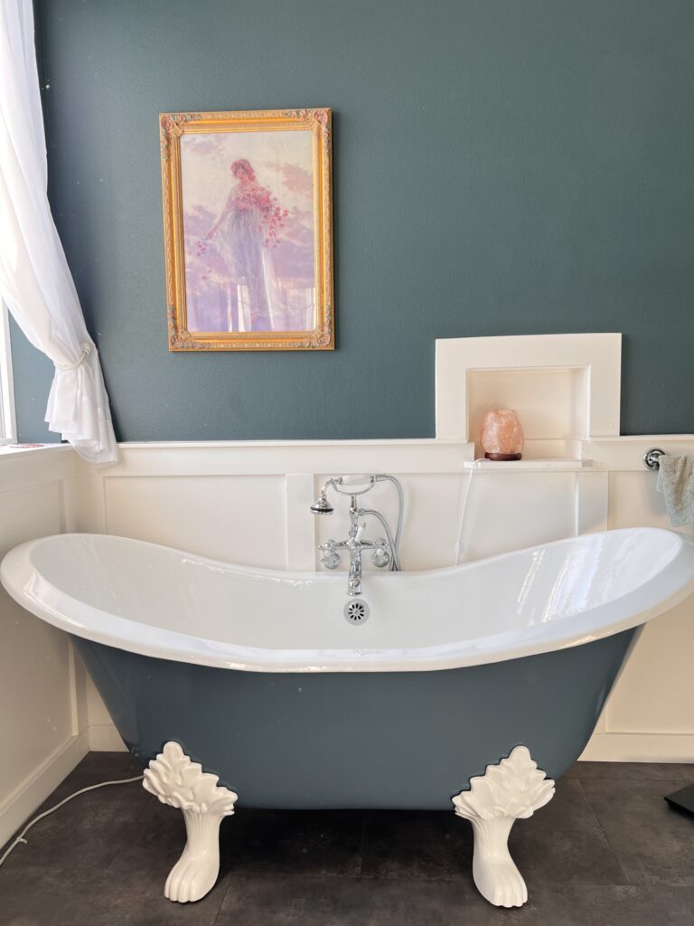 Photo of a bathroom remodel by Eagles with a freestanding tub